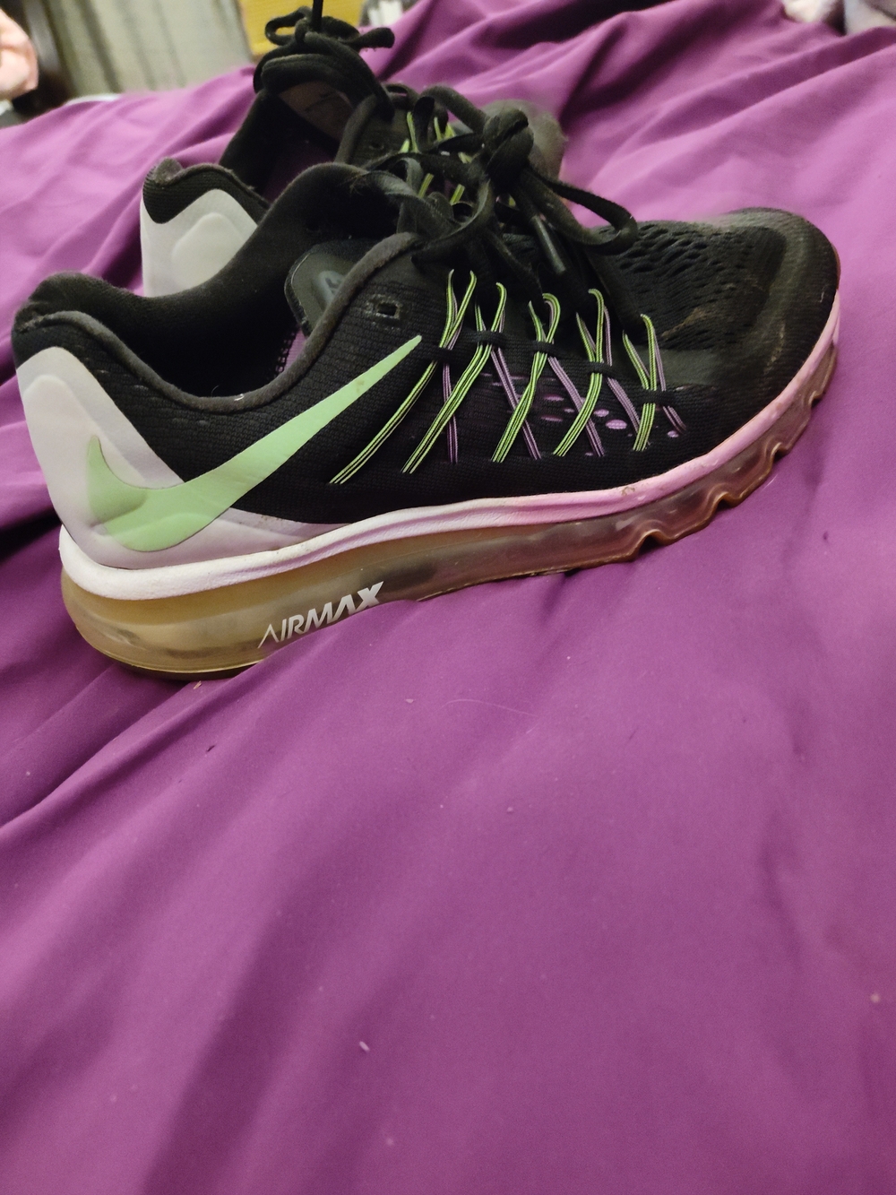 Nike Women’s Black Running Shoes with Mint and Lavender Accents